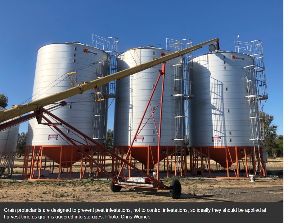 Three silos with a grain auger